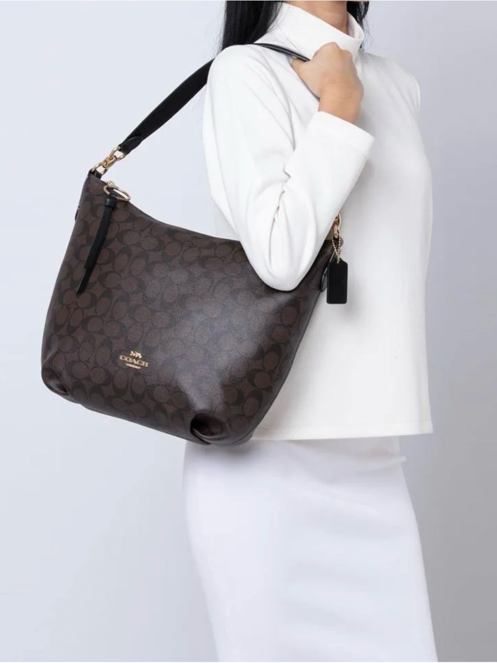 Like New COACH Skylar Hobo bag in signature canvas - Brown/Black w/gold hardware